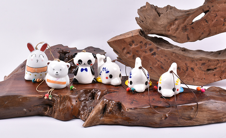 Traitement personnalisé de diverses petites cloches en céramique créatives de personnage de dessin animé