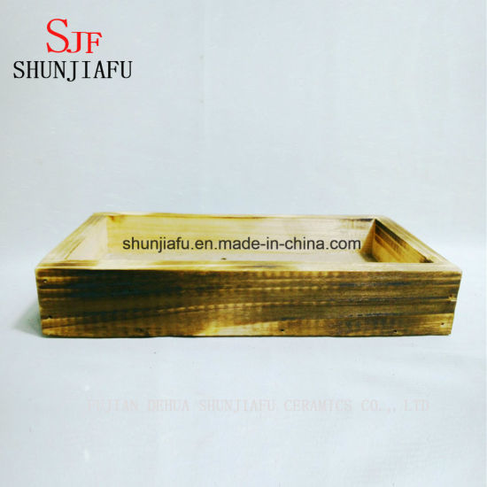 Petits pots de fleurs carrés en bois