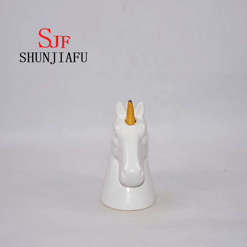 Tirelire t&ecirc;te de cheval en c&eacute;ramique