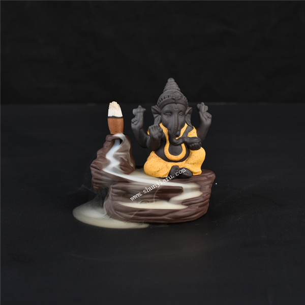 Br&ucirc;leur d'encens de ganesha en c&eacute;ramique jaune fum&eacute;e