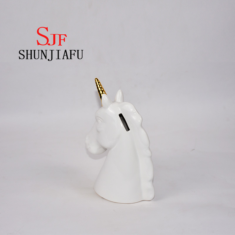 Tirelire t&ecirc;te de cheval en c&eacute;ramique