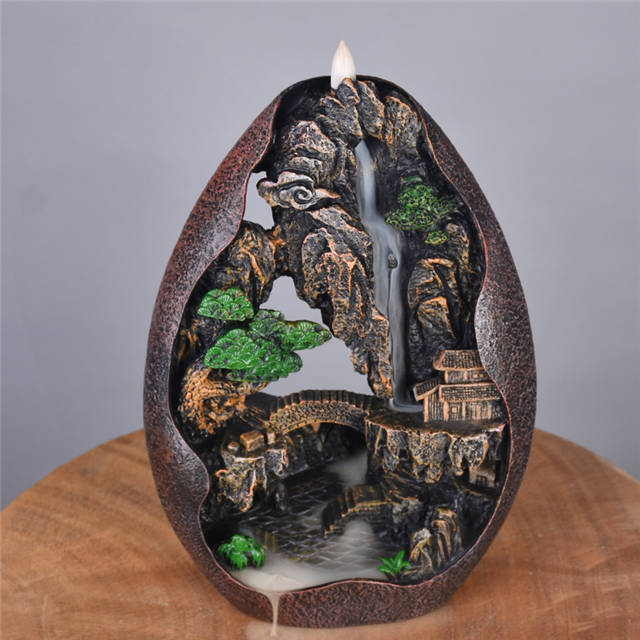 Brûleur d'encens à refoulement de conception de paysage de printemps rural