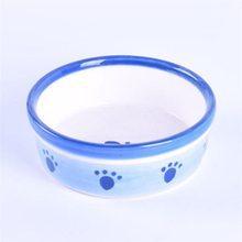 Bol circulaire à l'extérieur des empreintes de chien d'impression Bol pour chien en céramique et bol pour chat en céramique de bol en céramique pour animaux de compagnie