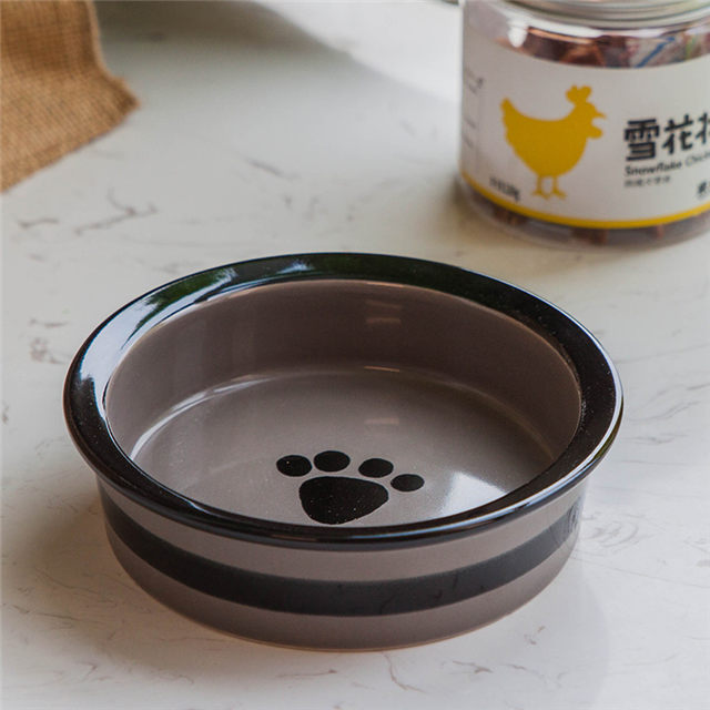 Cercle noir avec empreintes de pas imprimées en céramique circulaire pour chien Bol pour chien en céramique rose
