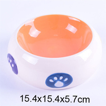 Bol à l'intérieur du bol orange à l'extérieur du tambour blanc empreintes de pas imprimées en céramique bol pour chien en céramique
