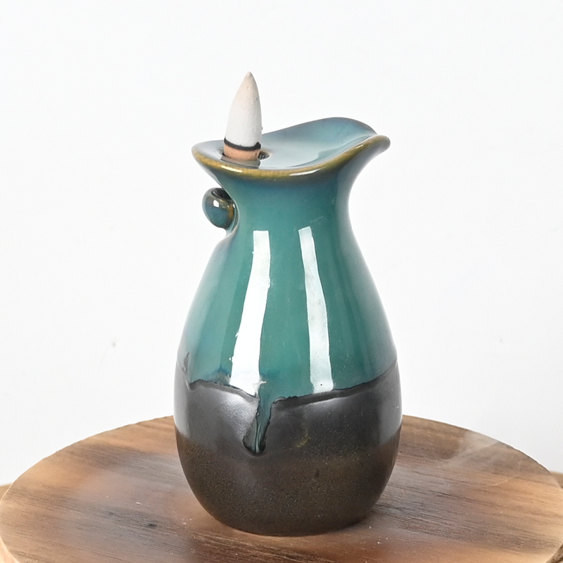 Conception de style vase encens en cascade en céramique brûleur d'encens de débit en céramique