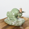 Brûleur d'encens à refoulement de cascade de conception de style de taureau en céramique de statue de vache