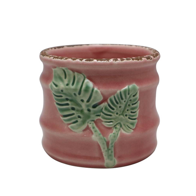 Pot de fleurs rose à feuilles vertes en relief en céramique