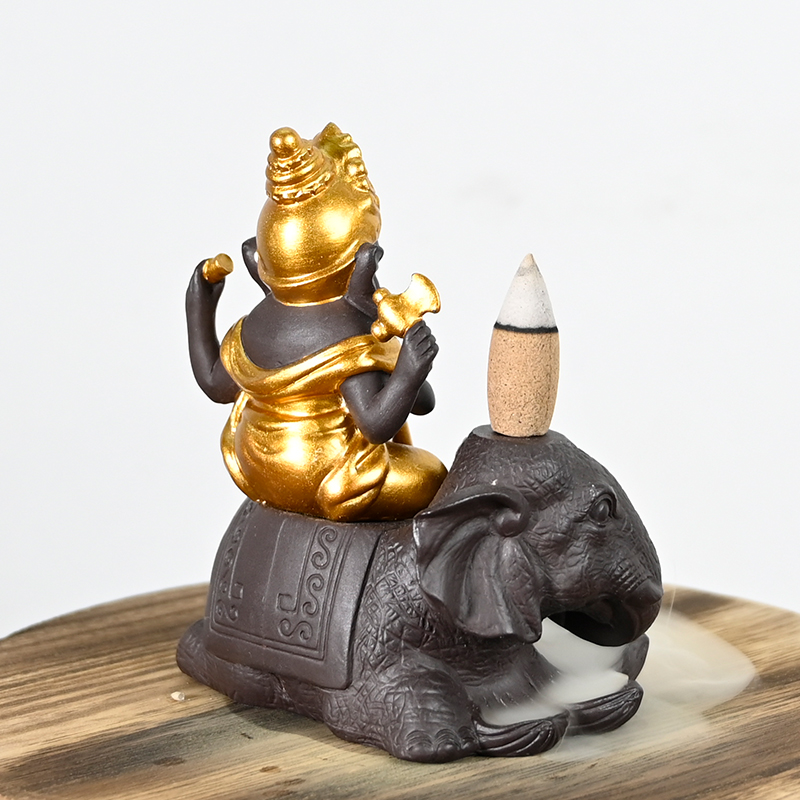 Céramique Ganesha Play Flûte Style Sites sur la cascade d'éléphant Backflow Encens Encense Ceramic Breakflow Incens Burner