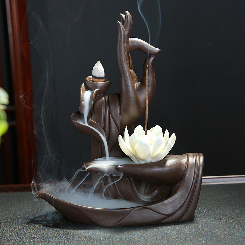 Céramique Bouddha's-Main tenant le brûleur d'encens en eau de fleur de fleur