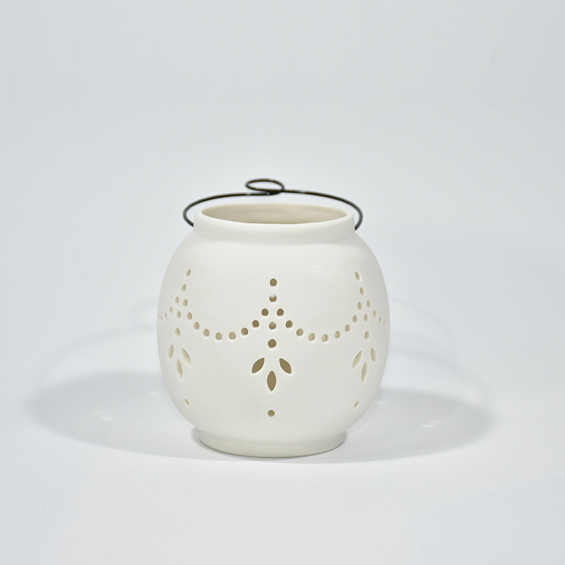 Porcelaine blanche portable circulaire creux bougie en céramique motif en céramique creux en céramique
