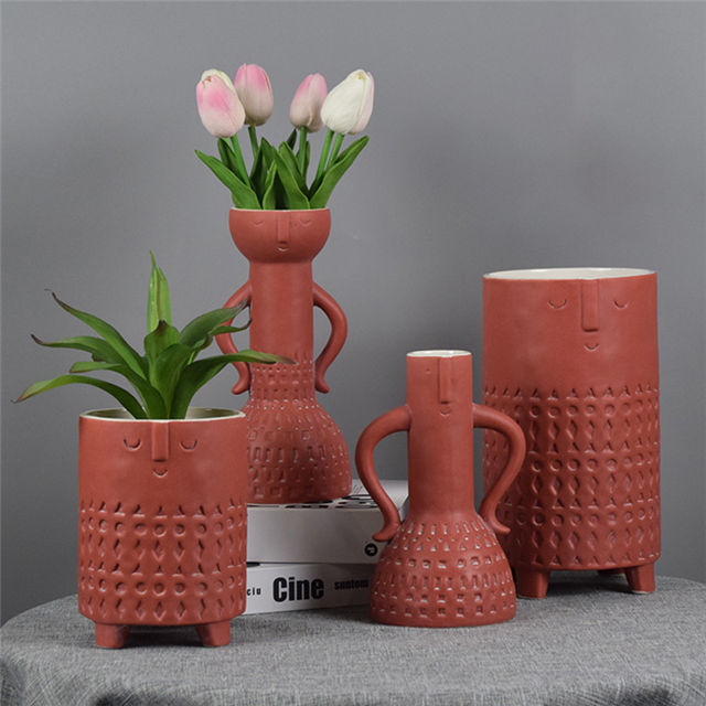 Décoration de table à la maison Diverses expressions faciales font face à des vases en céramique