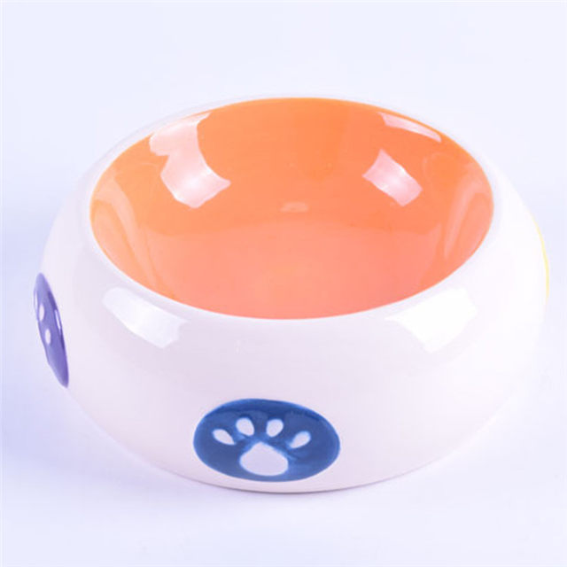 Bol à l'intérieur du bol orange à l'extérieur du tambour blanc empreintes de pas imprimées en céramique bol pour chien en céramique