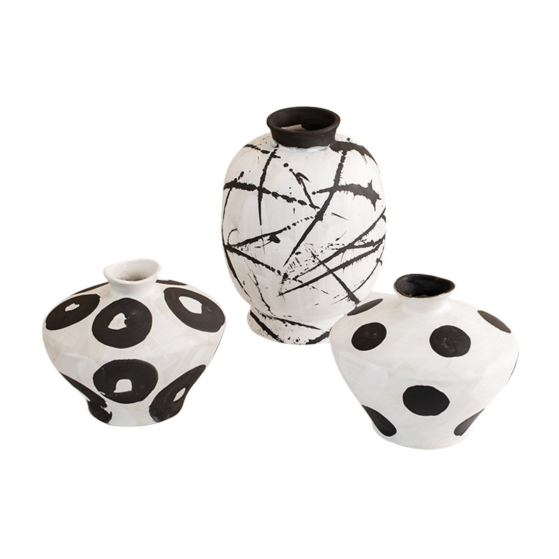 Où la Terre rencontre le vase en céramique artisanal de l'art