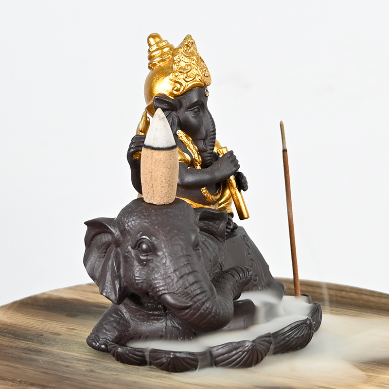 Céramique Ganesha Play Flûte Style Sites sur la cascade d'éléphant Backflow Encens Encense Ceramic Breakflow Incens Burner