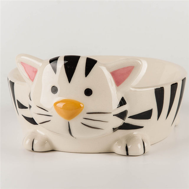Cercle noir avec la tête et les pieds de chat imprimés en céramique circulaire pour chien nourrisseur en céramique rose bol pour chat