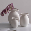 Sculpted Serenity Artisanal Ceramic Vases for Discerning Spaces