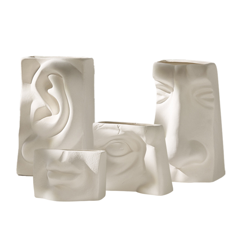 Oeil, oreille, bouche, conception de style nez conception en céramique Vase en porcelaine