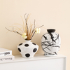 Où la Terre rencontre le vase en céramique artisanal de l'art