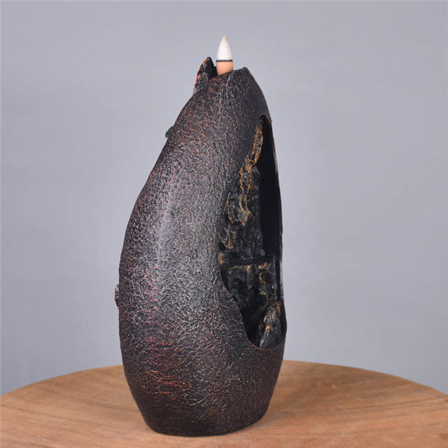 Brûleur d'encens à refoulement de conception de paysage de printemps rural