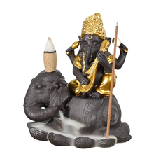Céramique Ganesha est assis sur la cascade de l'éléphant Breakflow Breakflow Breakflow Encense Breakflow Breakflow