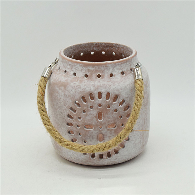 Star éclairage Style d'horloge meilleure vente nouvelle couleur cylindre en céramique évidant le style de moulin à vent évidant la lanterne d'ouragan