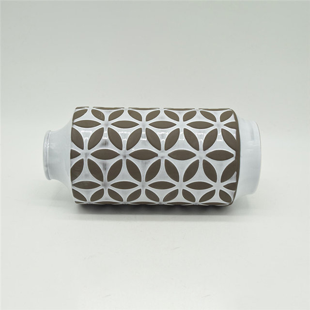 Vase en céramique de style rugby noir à pois blancs de style moderne