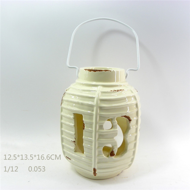 Décoration d'ameublement orange rouge cylindre en céramique forme de bande de style évidant lanterne en céramique d'ouragan