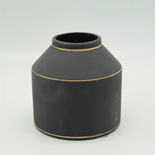 Vase en céramique noire d'or coloré de style de rugby de points blancs de style moderne