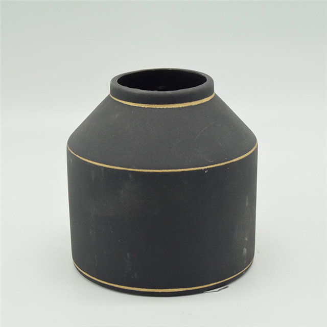 Vase en céramique noire d'or coloré de style de rugby de points blancs de style moderne
