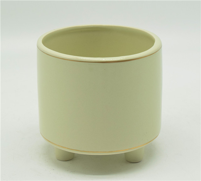 Pot de fleurs jaune clair de dessus de table avec trois pieds Pot de fleur en céramique blanche à trois pieds