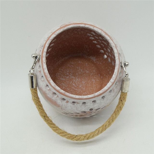 Star éclairage Style d'horloge meilleure vente nouvelle couleur cylindre en céramique évidant le style de moulin à vent évidant la lanterne d'ouragan