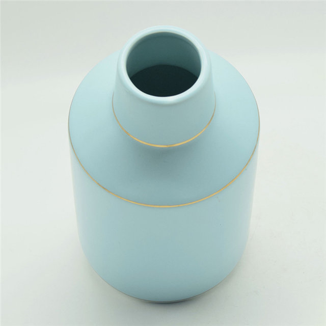 Vase en céramique de grand corps vert doré coloré de style de rugby de points blancs de style moderne