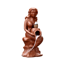 La sirène de la déesse en céramique baigne le brûleur d'encens à reflux en céramique de parfum fluide