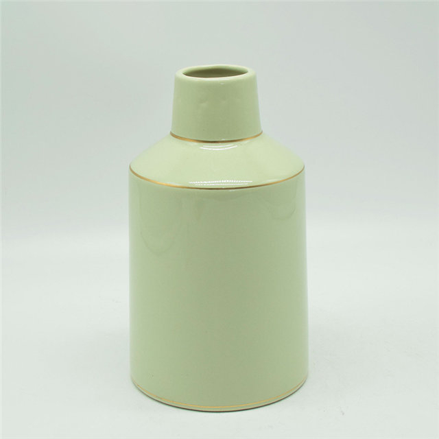 Vase en céramique d'originalité de grand corps coloré jaune d'or de style de rugby de points blancs de style moderne