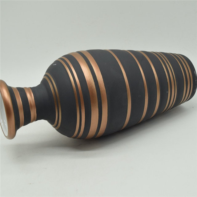 Vase en céramique de couleur or noir de style de rugby de points blancs de style moderne