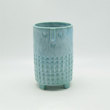 Ameublement Décoration noir Glaçure bleue Expression du personnage Support à quatre pattes Pot de fleurs en céramique