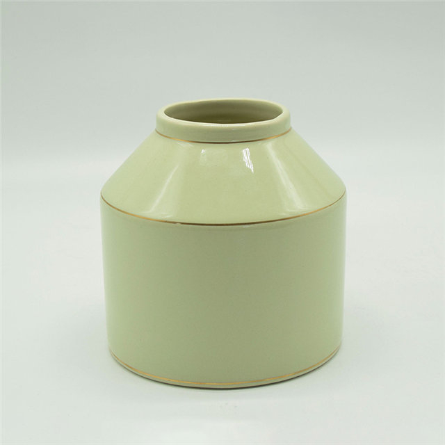 Vase en céramique de personnalité caractéristique de grand corps jaune d'or coloré de style de rugby de points blancs de style moderne