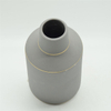 Vase en céramique de grand corps gris d'or de style de rugby de points blancs de style moderne